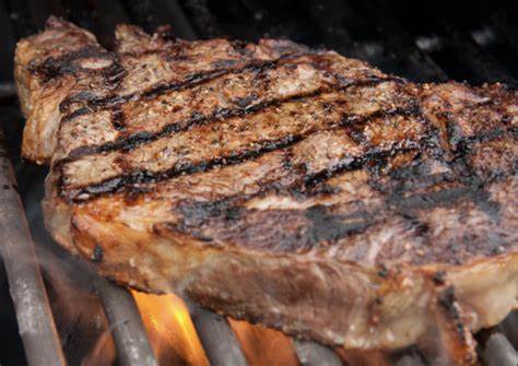 ribeye steak on a gas grill