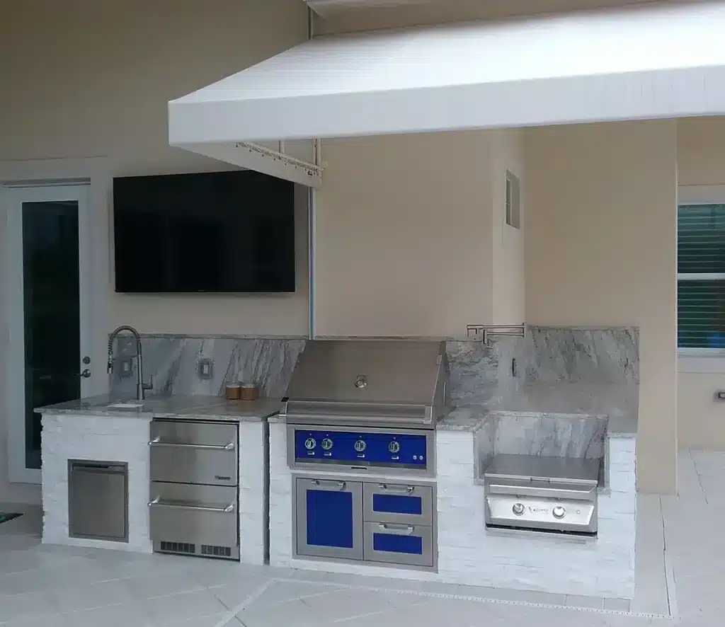 Contemporary retractable awning extending over an outdoor patio area for adjustable shade.